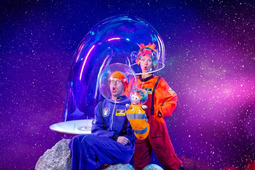 two astronauts looking surprised with a bubble over their heads