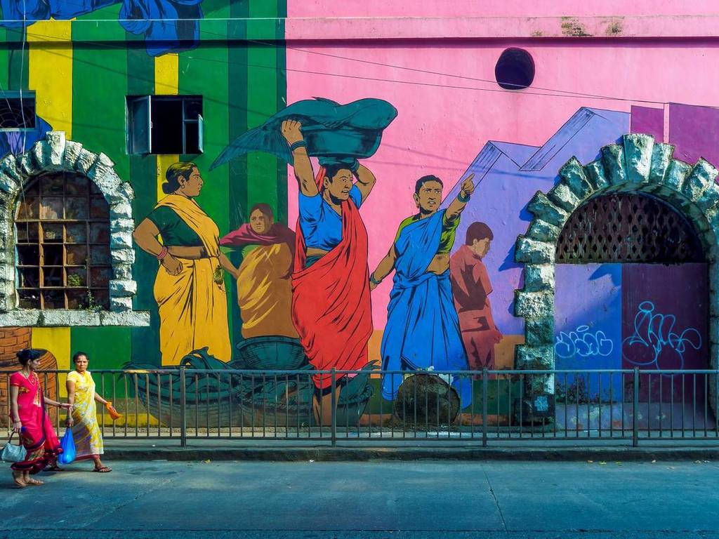 Indian art murals that are colourful and depict local life