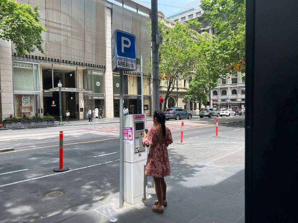 woman parking her car in Melbourne