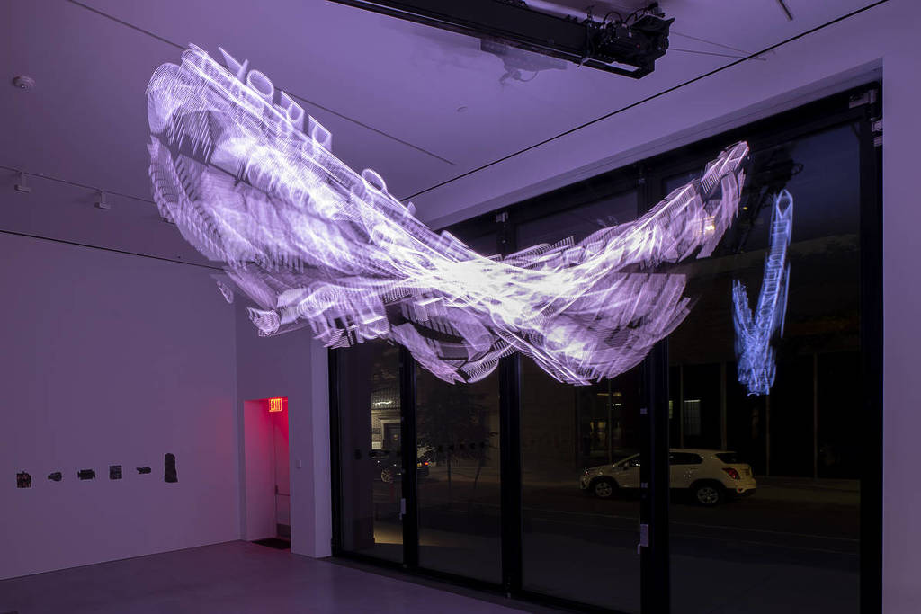 view of Jenny Holzer's WTF creation, which is LED words on a kinetic sculpture