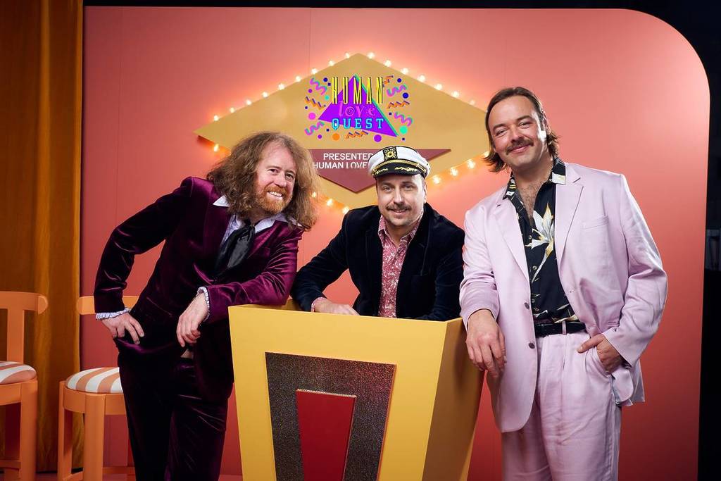 comedians posing as game show hosts for Human Love Quest