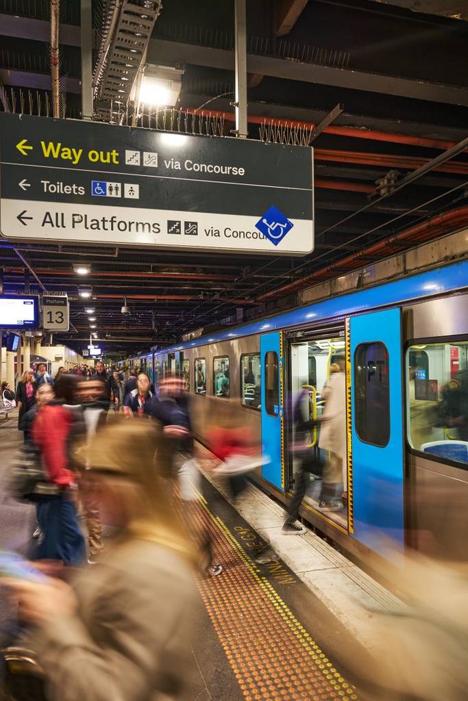 melbourne residents catching public transport shutterst