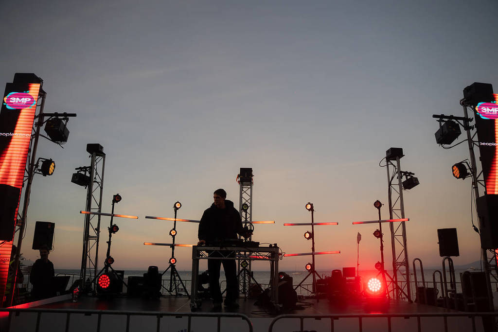 a performer on stage at dusk during Sorrento Solstice Festival