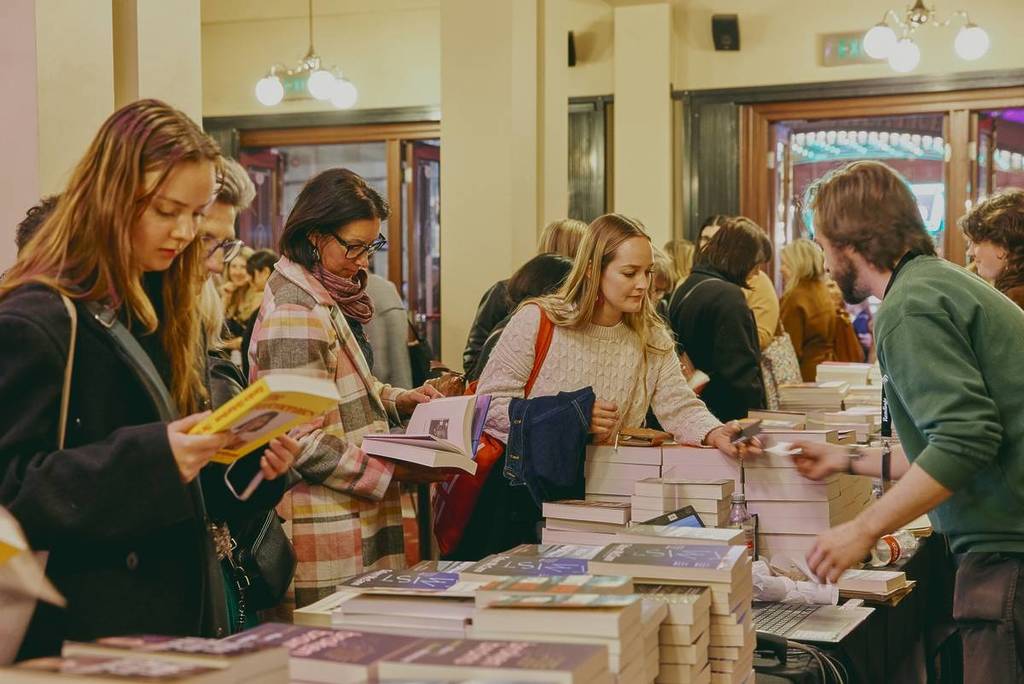 people browsing through books at Melbourne Writers Festival