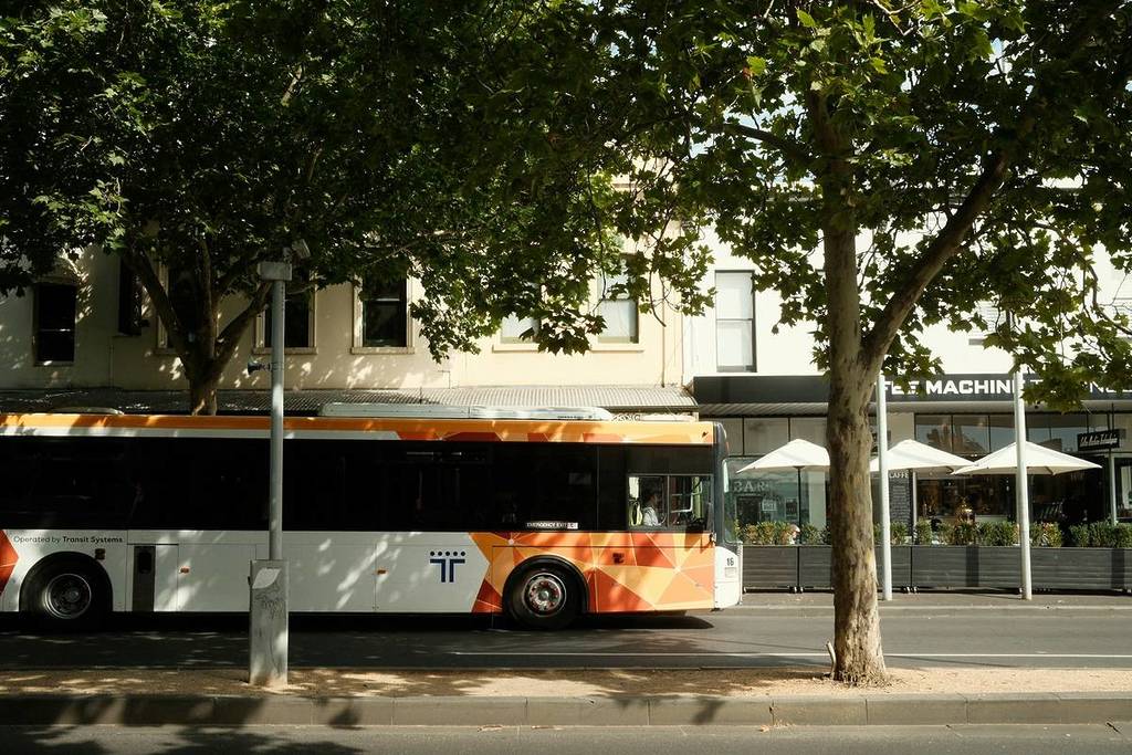 a bus on a street in Melbourne