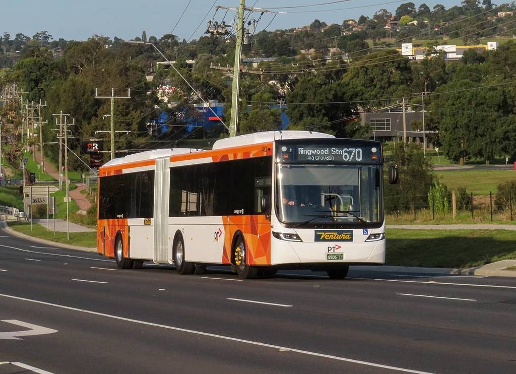 a bus on a street in a Melbourne suburb