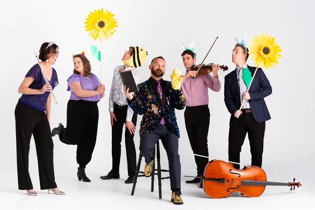 musicians from family-friendly group Inventi Ensemble with props and instruments