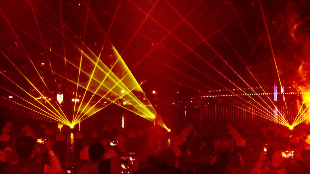 lasers pointing to the sky in Docklands for Firelight Festival