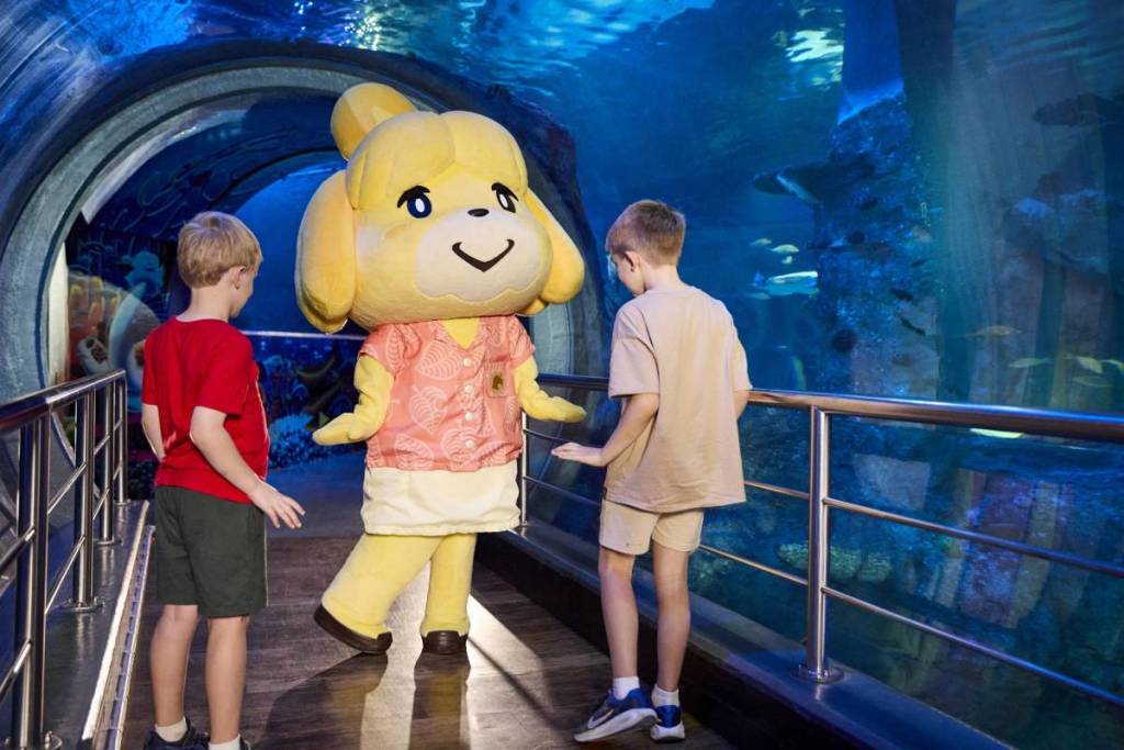 two boys meeting an Animal Crossing character at SEA LIFE Melbourne Aquarium