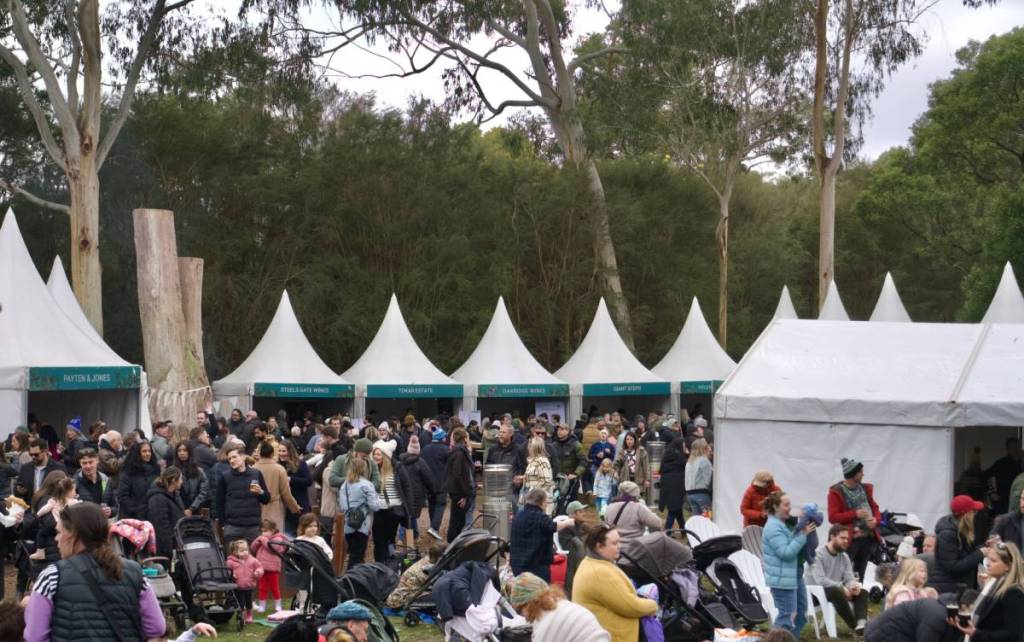 people browsing among the wine tasting stalls during Wine & Wildlife at Healesville Sanctuary