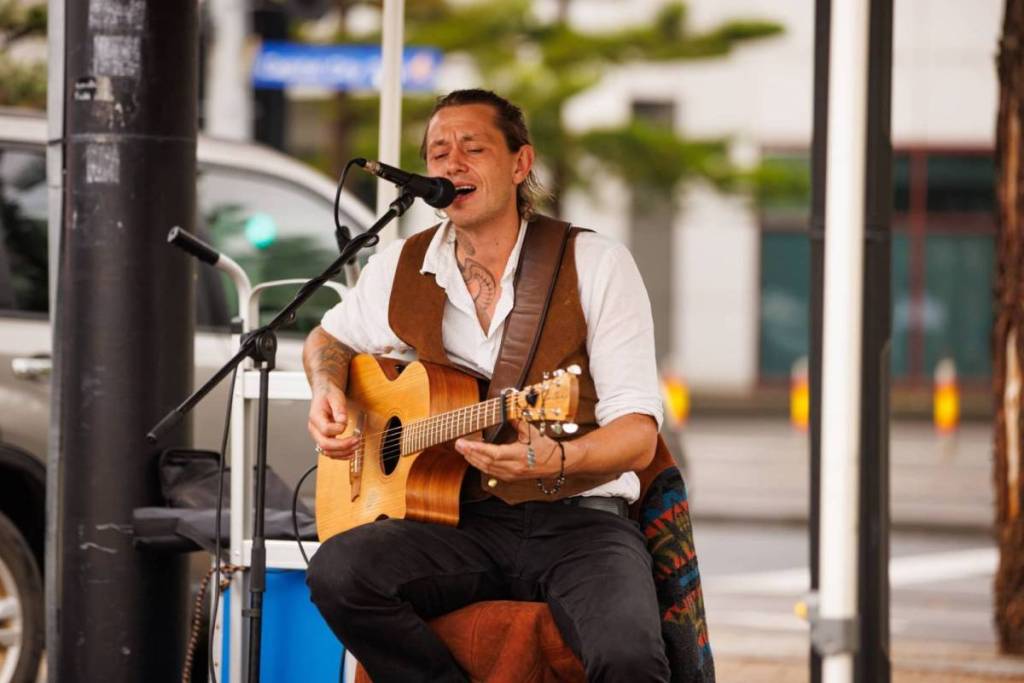 live music playing at the farmers market