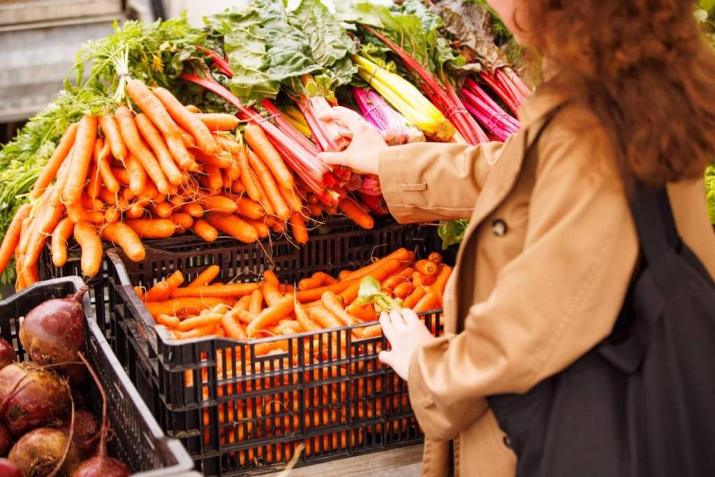 carrots being picked out at Docklands Waterfront Farmers’ Market
