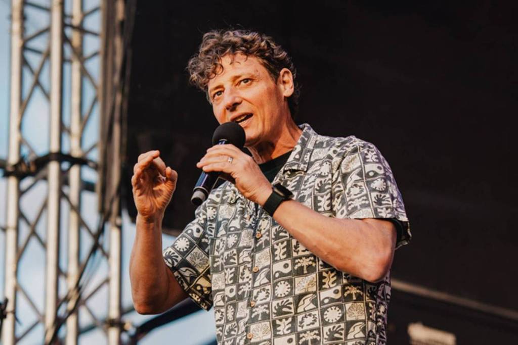A comedian on stage at Comedy in the Vines.