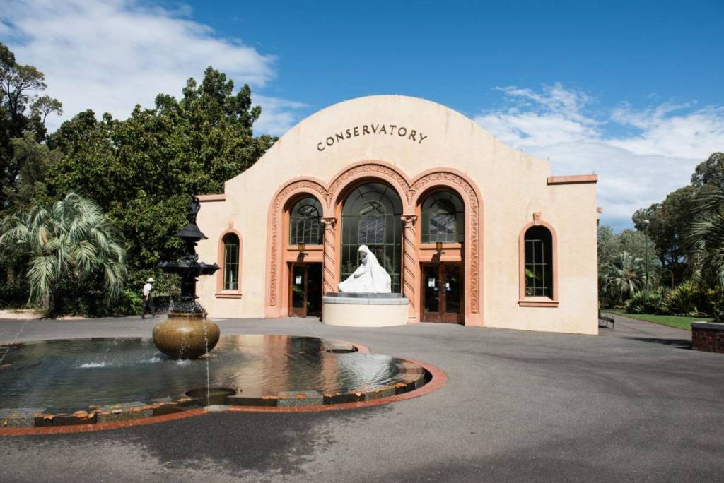 outside of The Conservatory building in Fitzroy Gardens