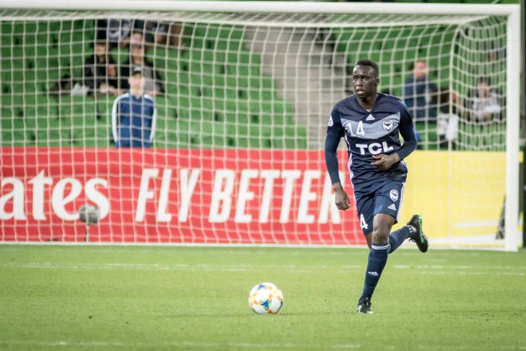 Thomas Deng playing soccer at the Asian Champions League
