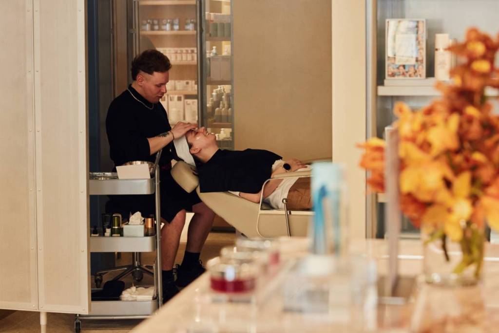 someone getting a skin treatment or facial done at the MECCA store in Carlton