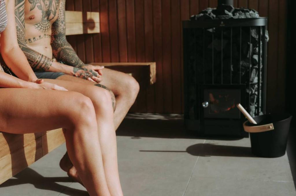 two people sitting inside Koho Sauna