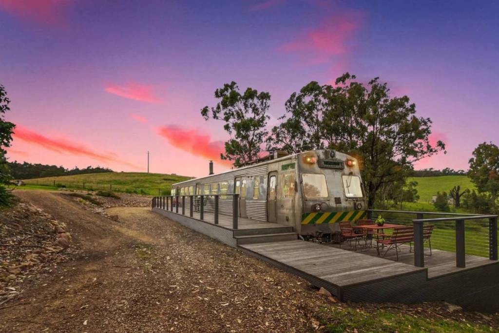 the Hitachi train carriage house at sunset