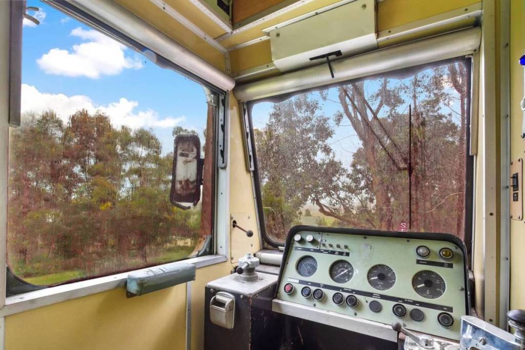inside the driver's cab of the Hitachi train carriage house