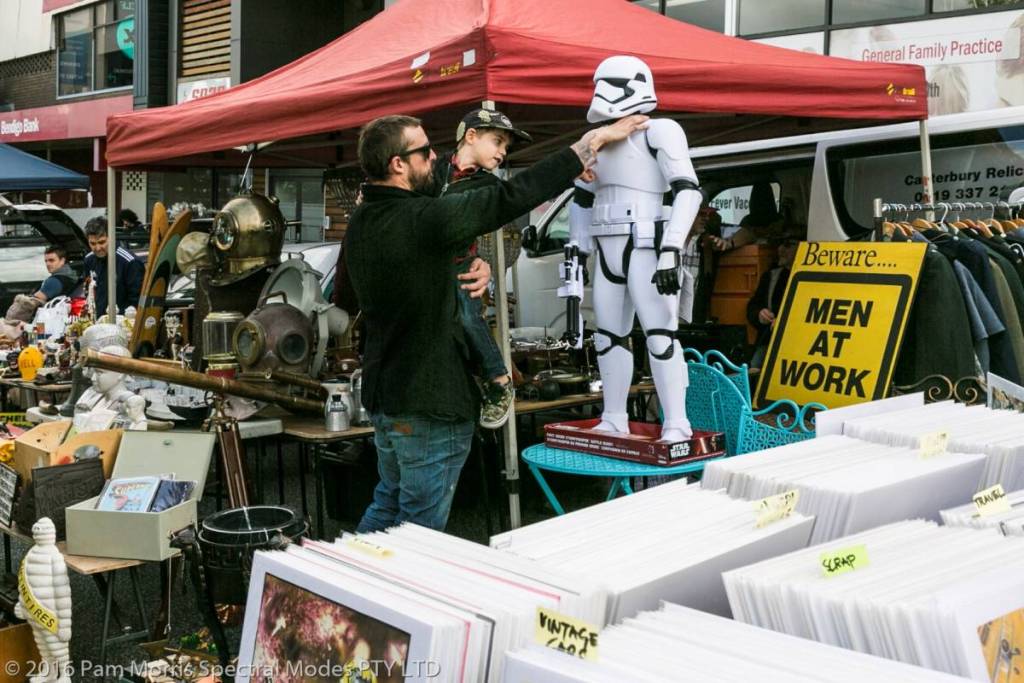 man looking at Stormtropper next to vinyl records at Camberwell Sunday Market