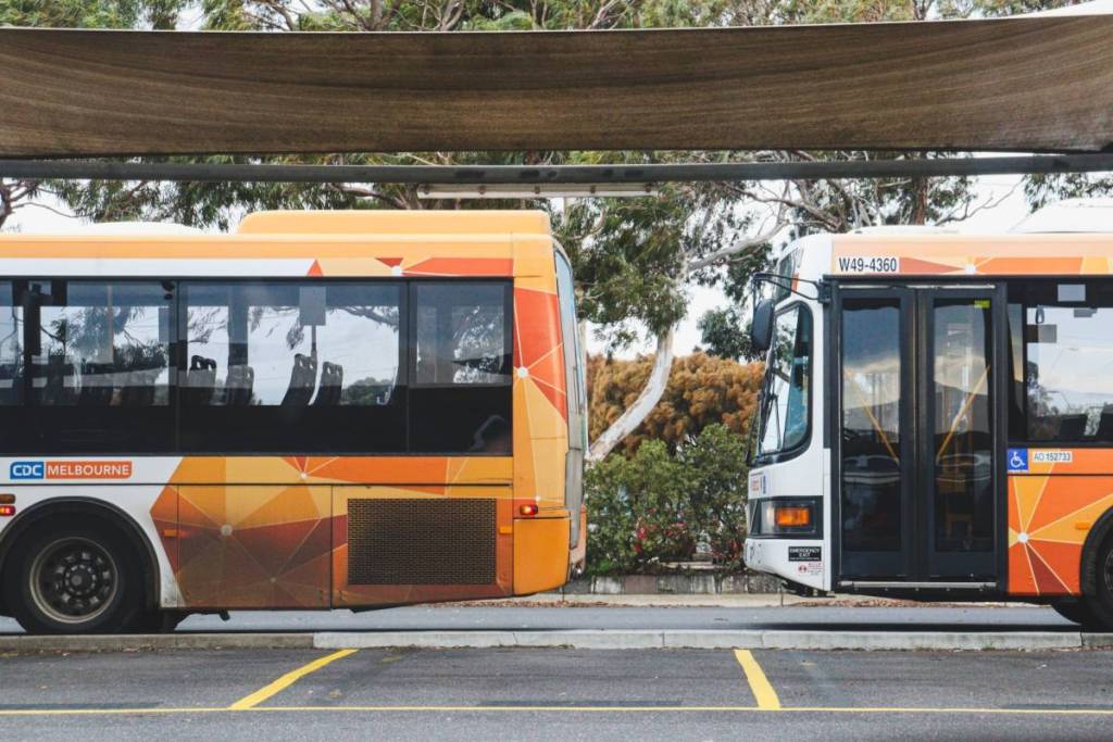 two buses at a stop in Hoppers Crossing, Melbourne