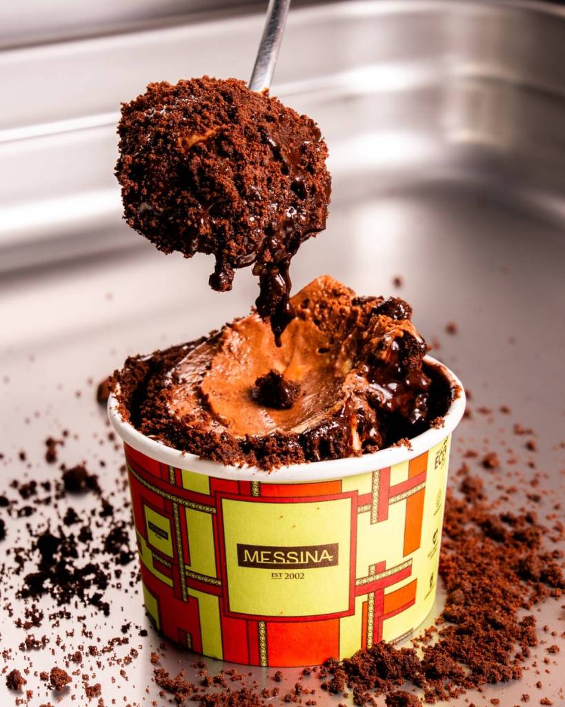 Bertha loves Mertha special gelato, with a spoon filled with crumbly bits revealing the chocolatey inside