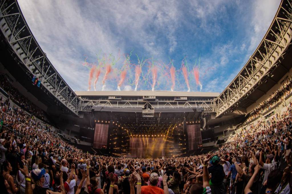 crowds at a concert in a tennis arena during AO Live