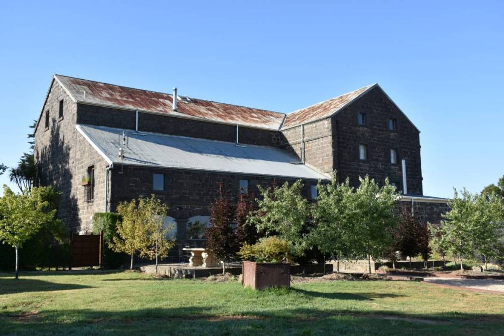 the historic bluestone building of Campaspe Mill Distillery