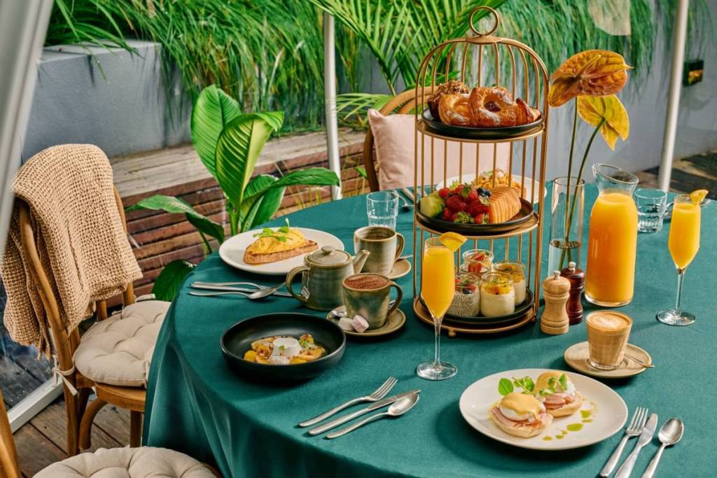 breakfast and brunch options on a table at Fern's Hidden Winter Garden