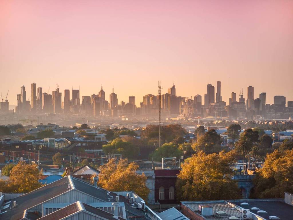 view of Melbourne skyline on a misty morning, overlooking residential buildings from Footscray