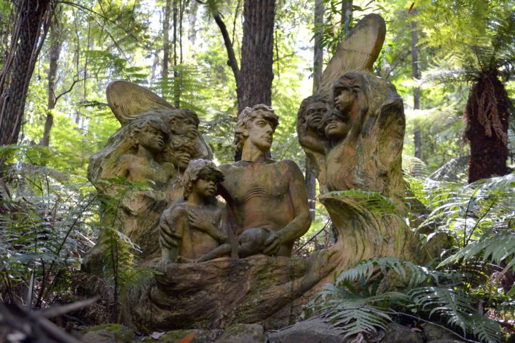 sculpture of man surrounded by faces at William Ricketts Sanctuary