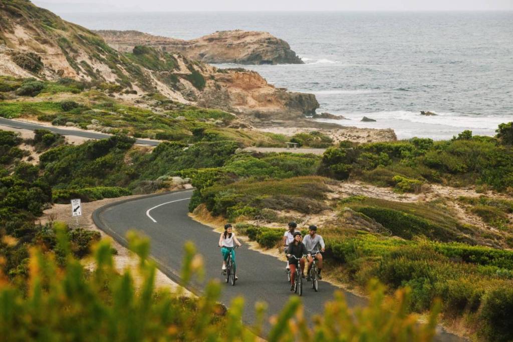 four people riding bikes at Point Nepean near Portsea