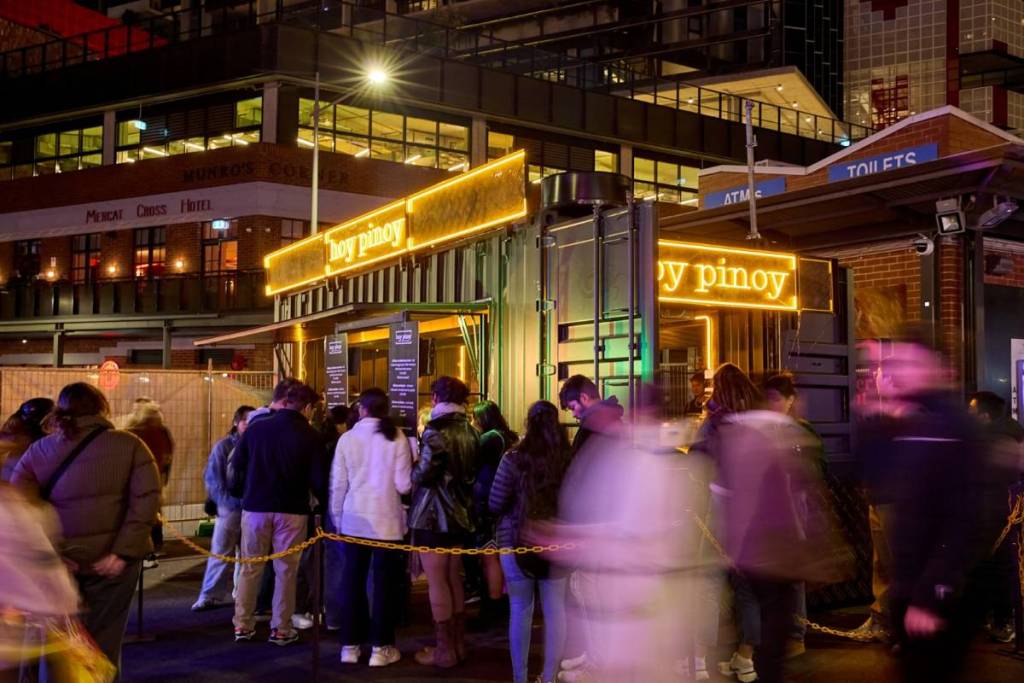 people in line to get some food from Hoy Pinoy