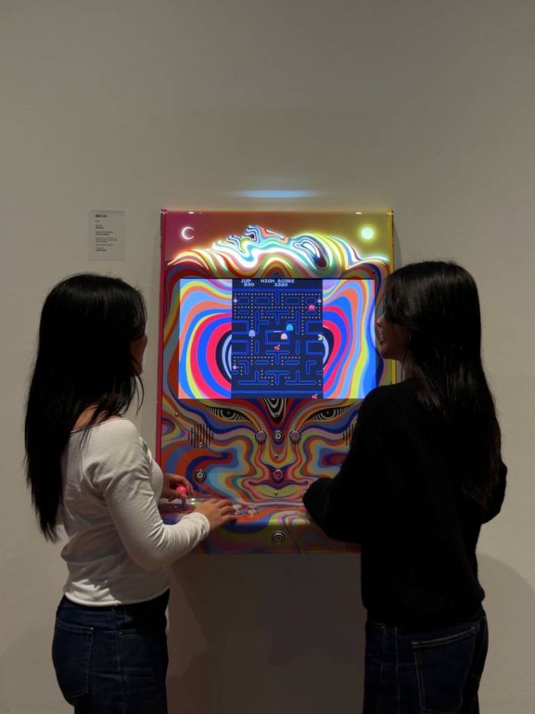 girl's playing at Arca Arcade exhibition in Melbourne