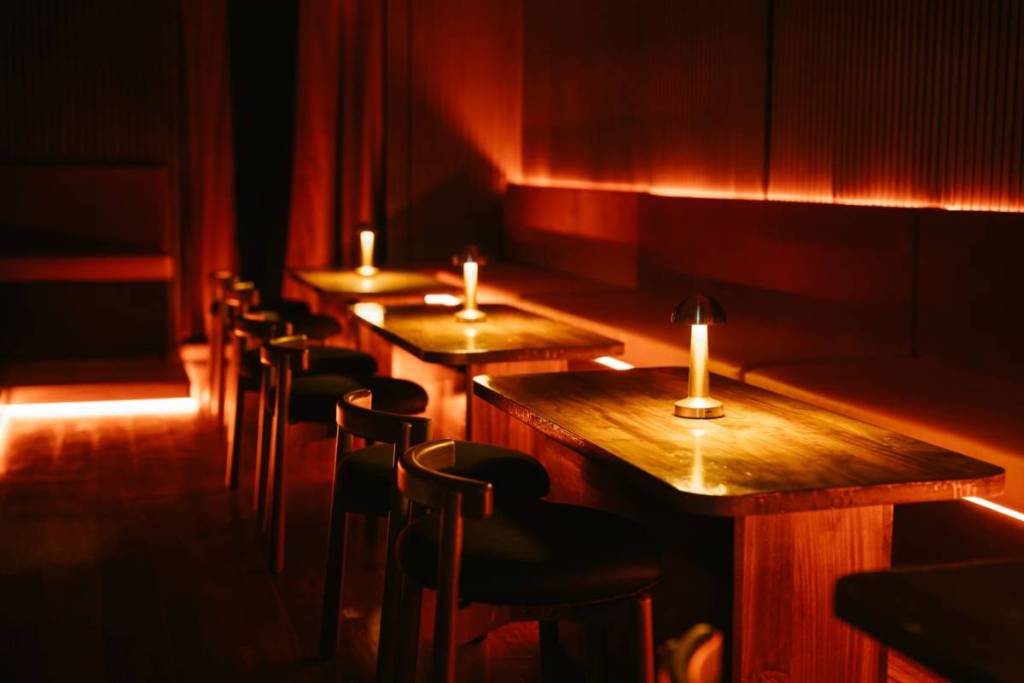 moody lighting and tables at Flair in Melbourne