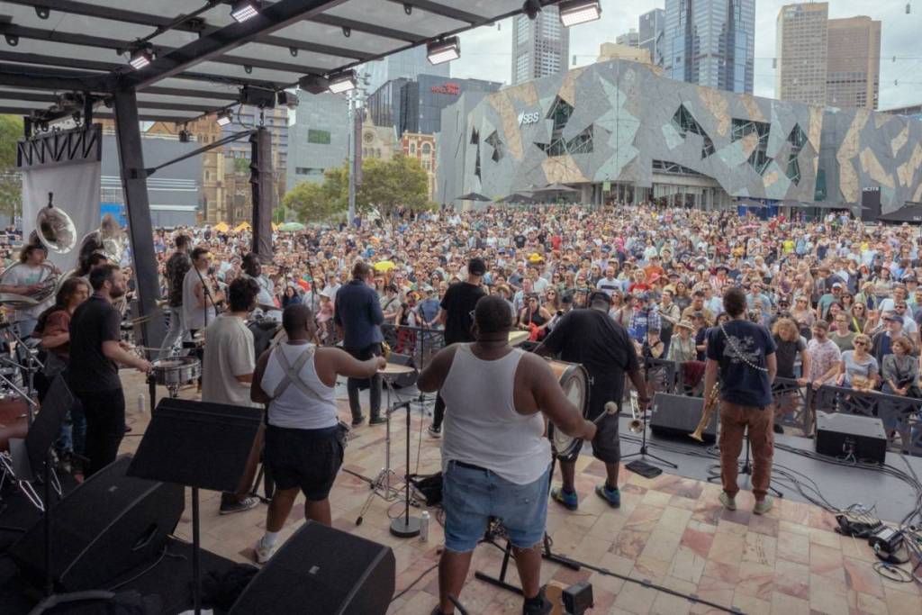 view from stage at Fed Square during Melbourne International Jazz Festival, with performers in front of a crowd