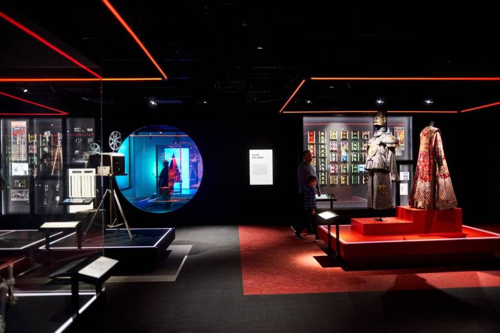 costumes and items on display at an ACMI exhibition