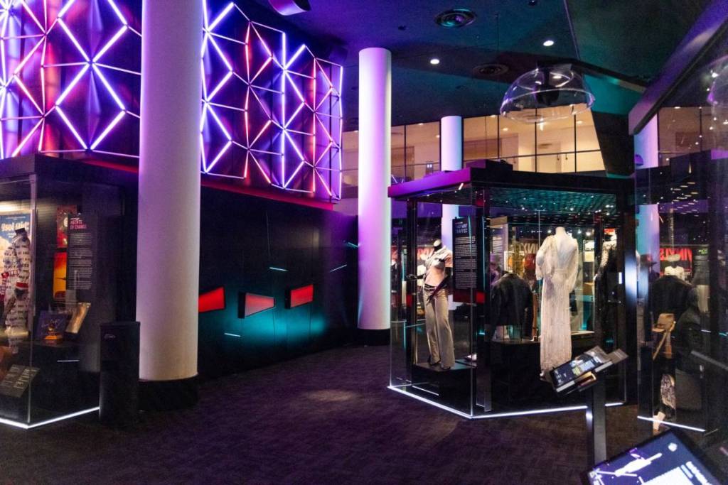 items on display and neon lights shining in Australian Music Vault