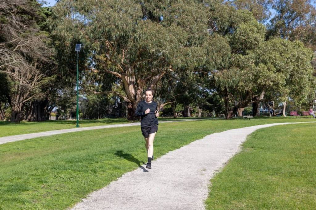 woman jogging on track in Wattle Park