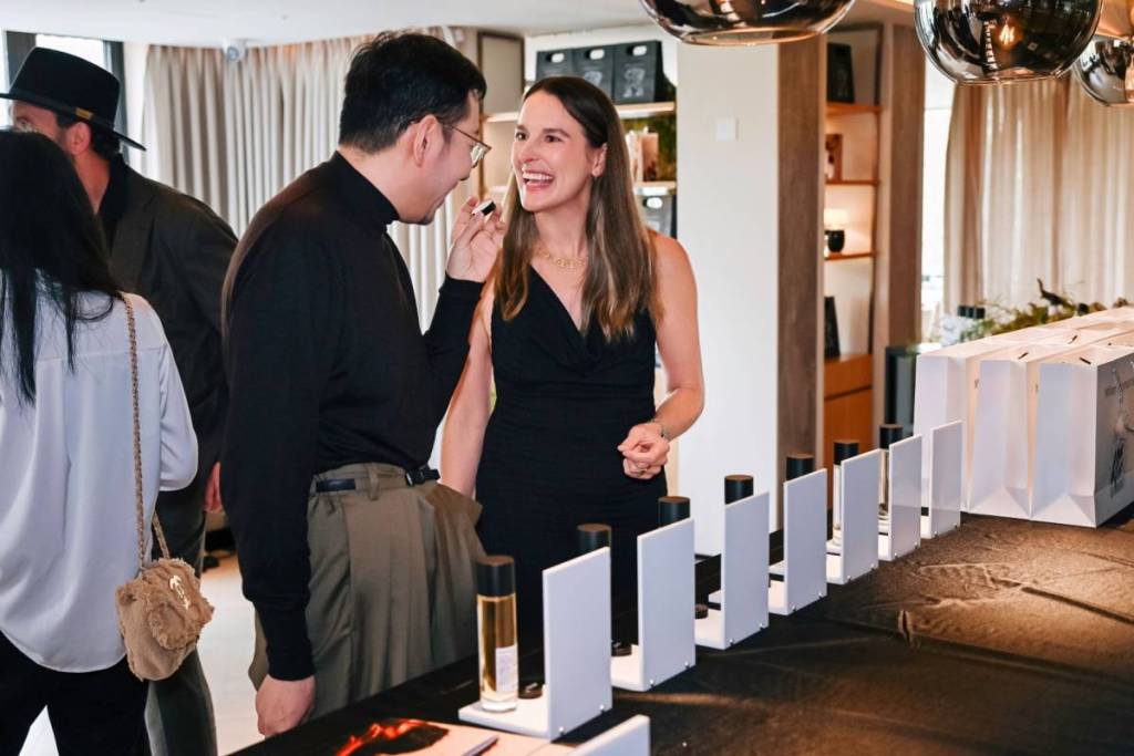 two people smelling a scent for geelong fragrance fair