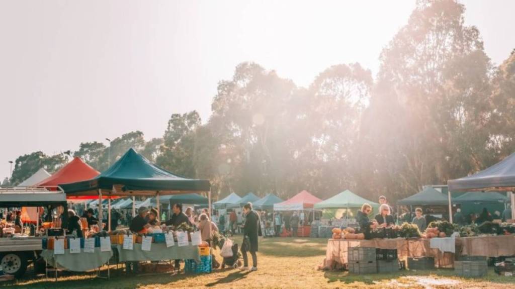 people gathered at Boroondara Farners Market in Melbourne