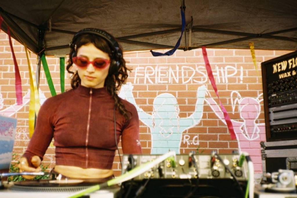 woman playing a DJ set