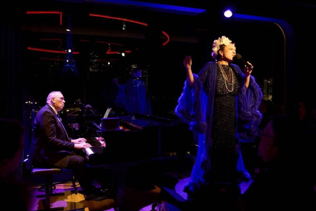 man playing piano while woman sings at The Beacon in Melbourne Recital Centre