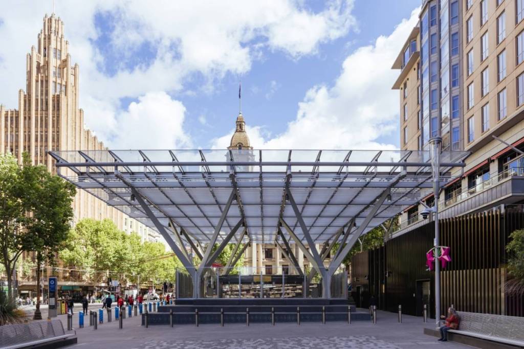 an empty City Square, looking towards the entrance of Town Hall Station