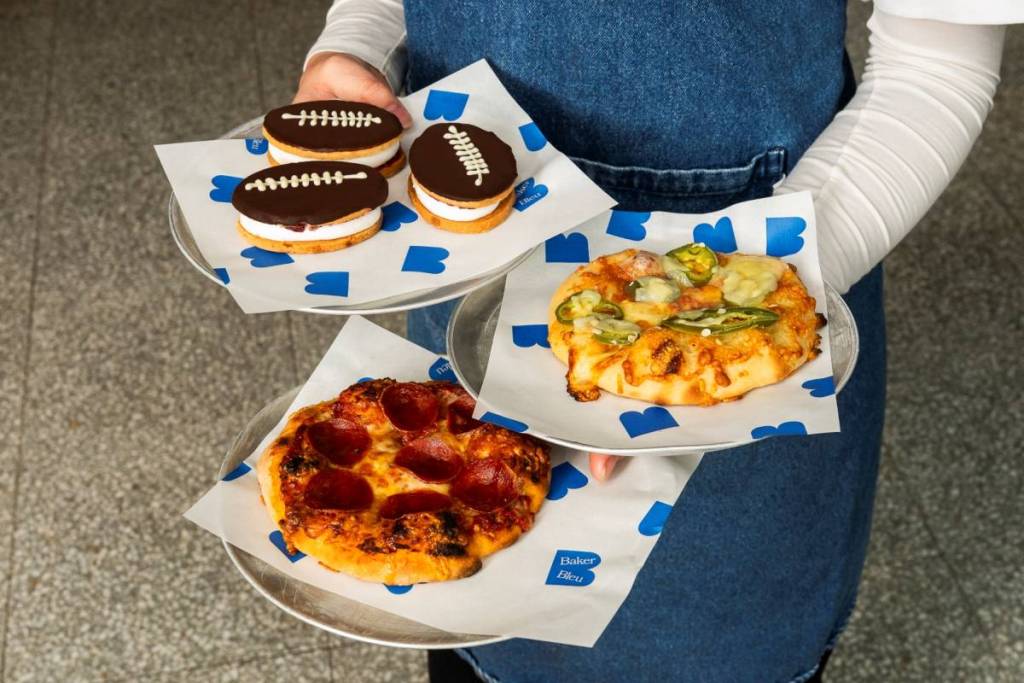 NFL football shaped cookies and little pizzas from Baker Bleu