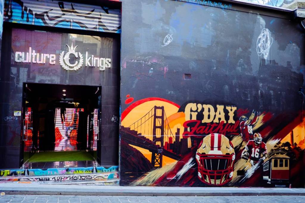 outside Culture Kings store, with San Francisco 49ers inspired street art