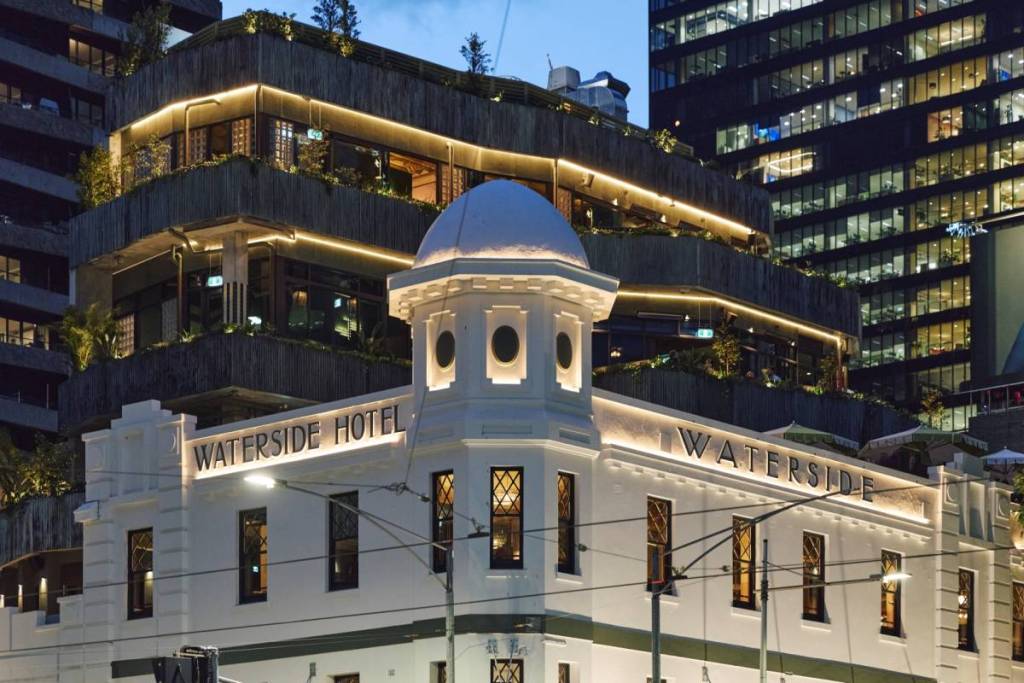 outside Waterside Hotel building at dusk