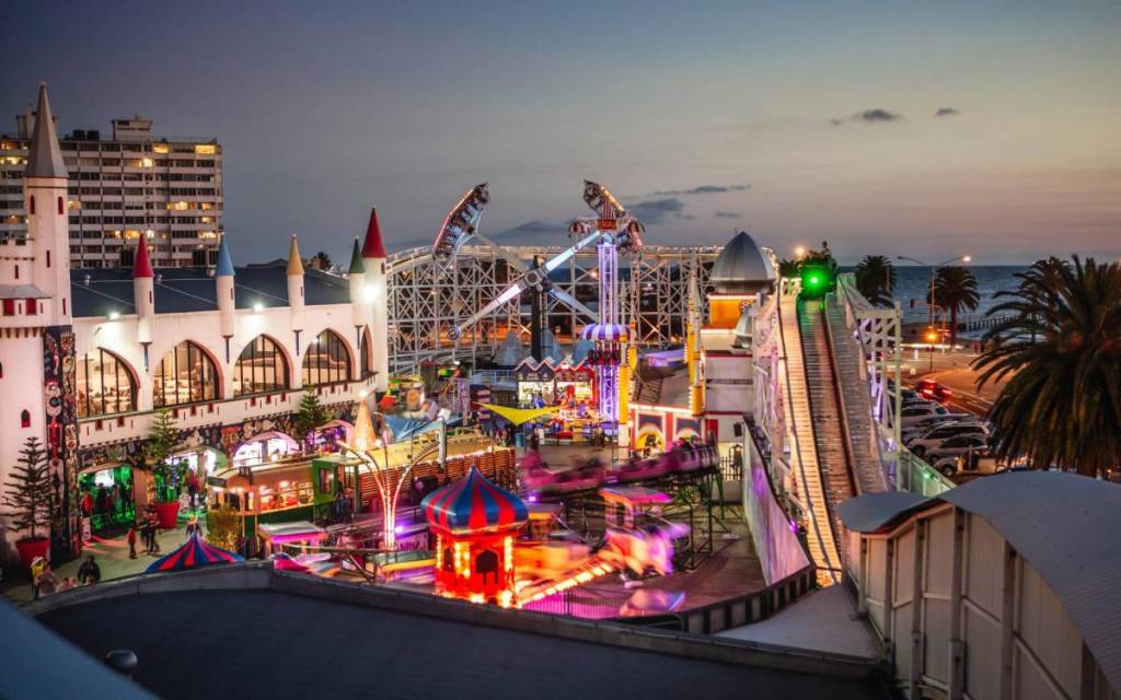 Luna Park at sunset, with all the lights from the rides switched on