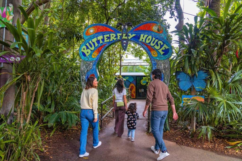 family entering the Butterfly House at Melbourne Zoo