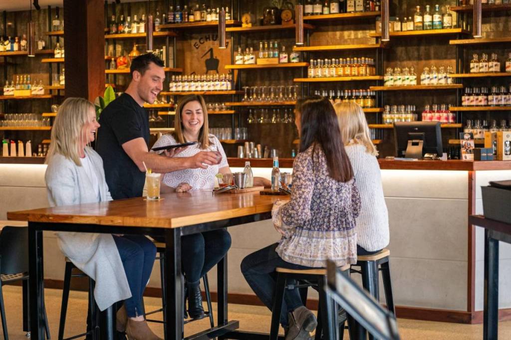 women receiving their drinks at Echuca Distillery